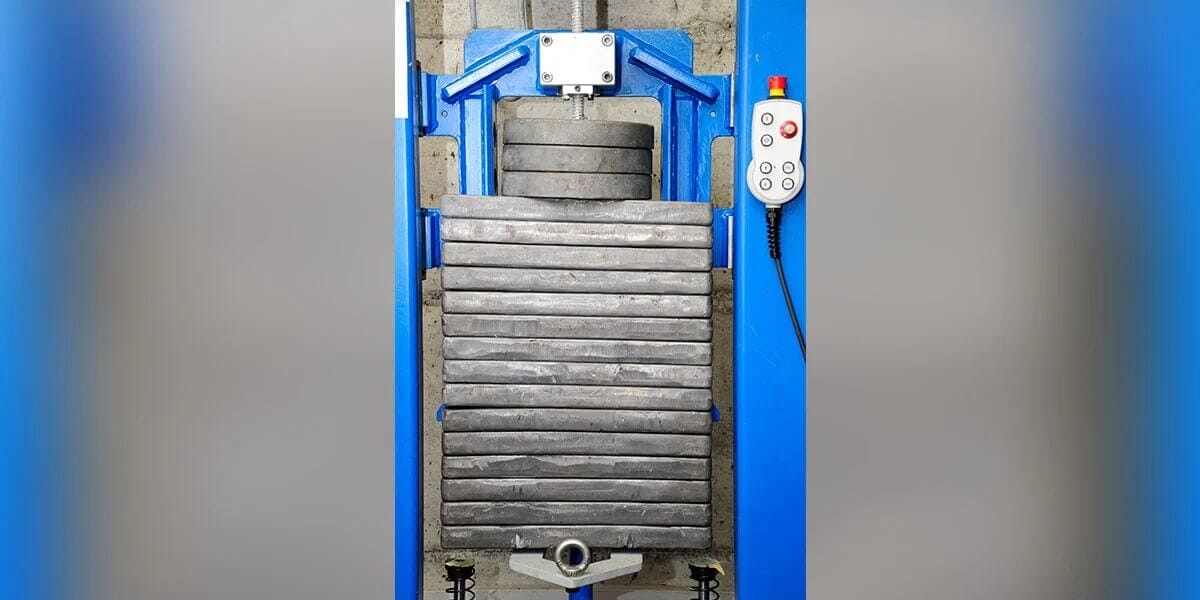 Load testing machine with weights and control panel