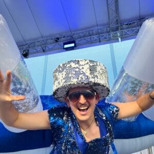 Person with glittering costume at an event
